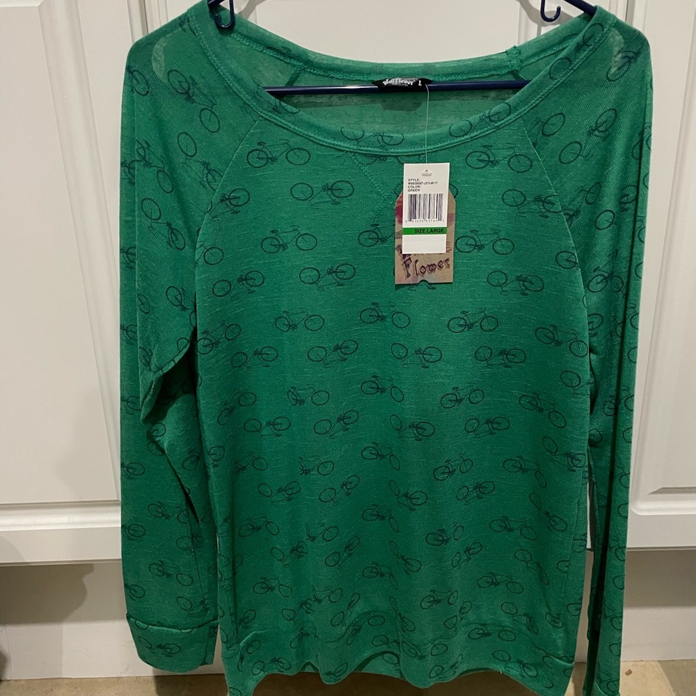 Womens large top, long sleeve. Green with bicycles on it in navy.